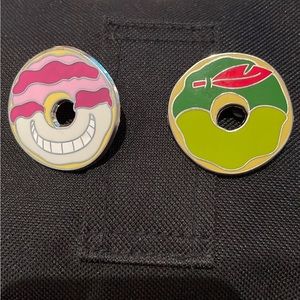 Peter Pan and Cheshire Cat donut shaped Disney pins